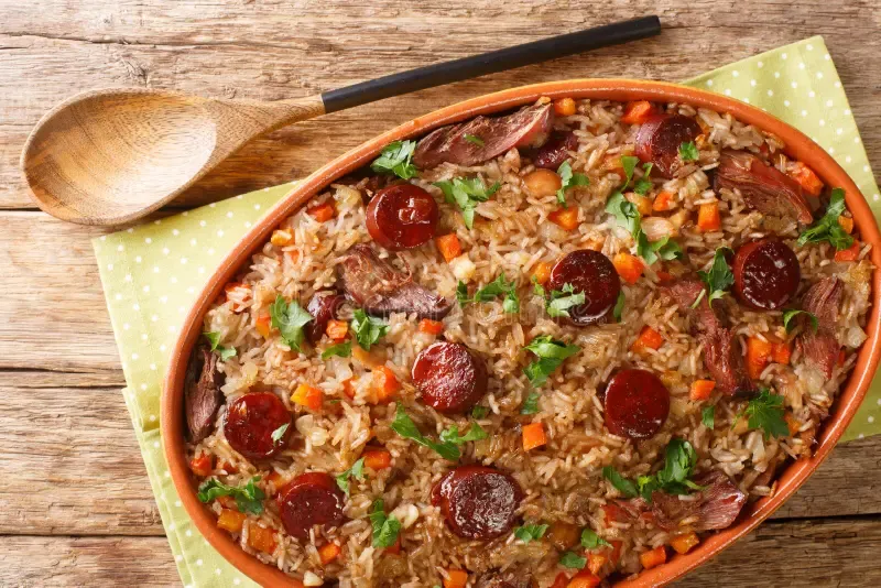 Arroz de pato duck rice baked with chouriço slices