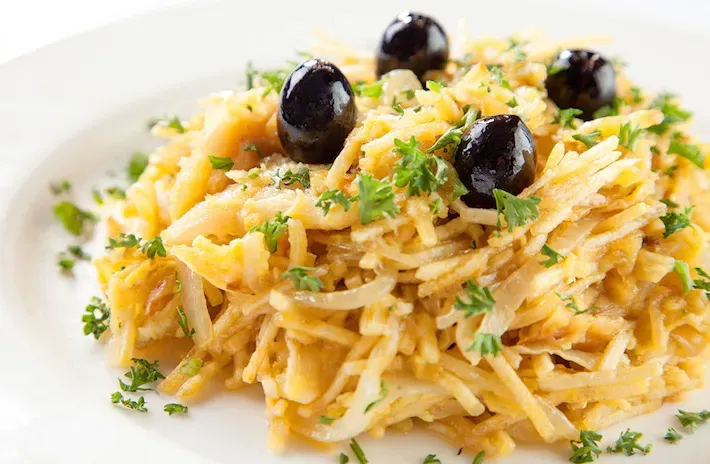Bacalhau à Brás with scrambled eggs and matchstick potatoes
