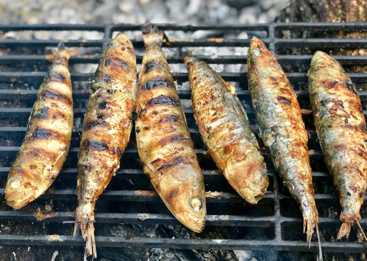 Sardinhas assadas whole grilled sardines
